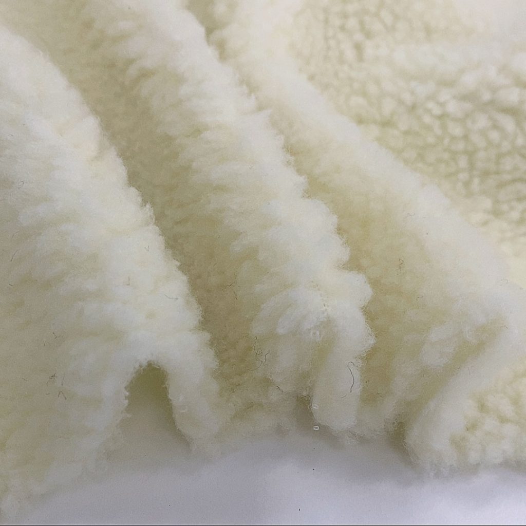 Hangzhou Kangman Textile Co., Ltd.100% Polyester Sherpa Fleece Fabric