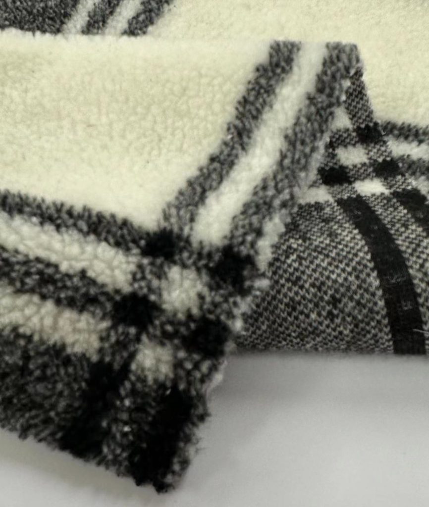 Hangzhou Kangman Textile Co., Ltd.Plaid Polyester Fleece Sherpa Fabric